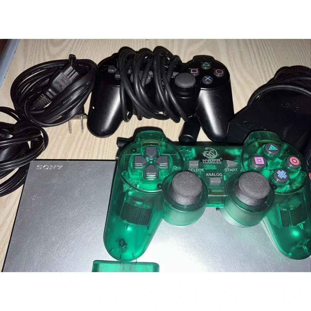 playstation 2 console,‎ 1 Wireless Controller 1 Reg Controller ,5 Games